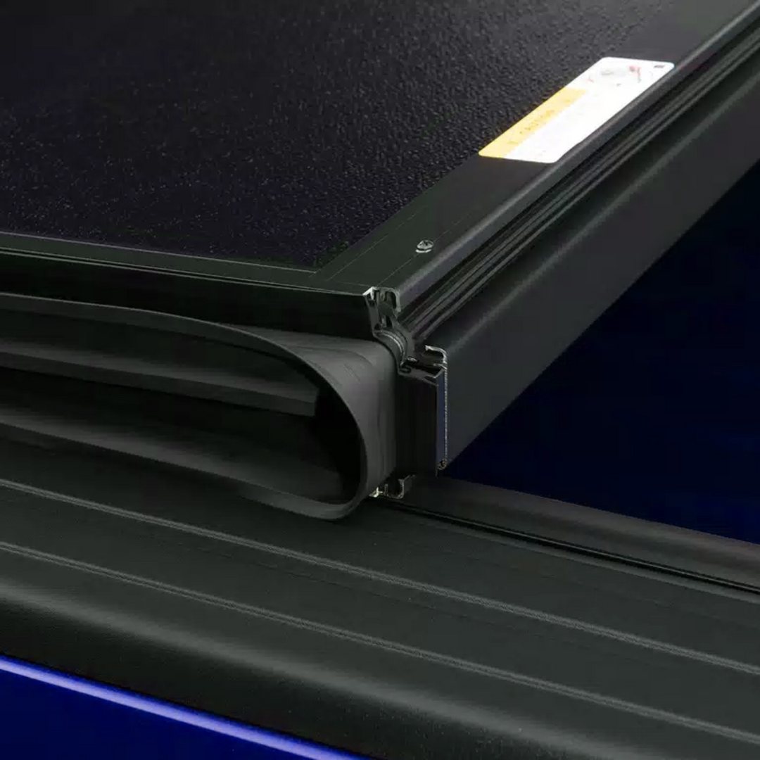 Chevrolet Colorado UnderCover Ultra Flex Hard Folding Truck Bed Tonneau Cover | Clearance Sale