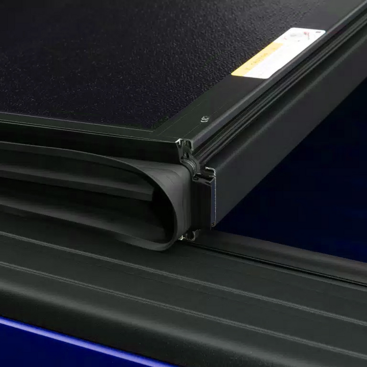 Chevrolet Colorado UnderCover Ultra Flex Hard Folding Truck Bed Tonneau Cover | Clearance Sale